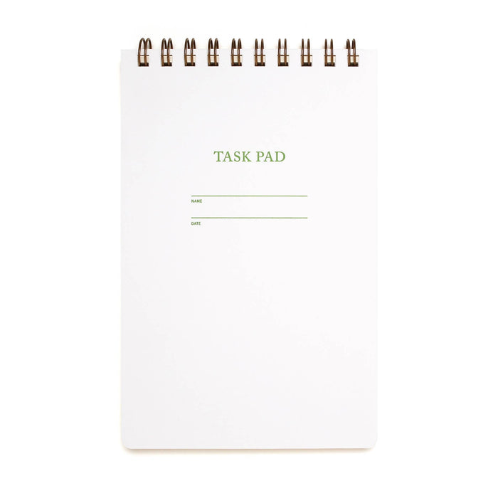 White task pad with 'Task Pad' text on a white background