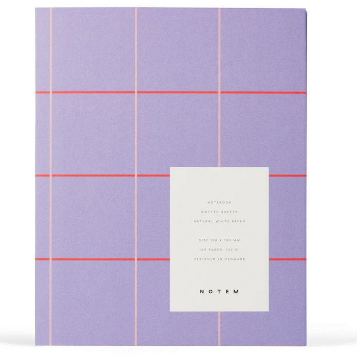 A Notem notebook with a lavender cover featuring a minimalist grid pattern in light pink and thin coral-red horizontal lines, with a white paper label on the front displaying product details.