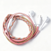 Posh Tech Wrapped Wired In-Ear Headphones with hand-wrapped braided cable in Coral.